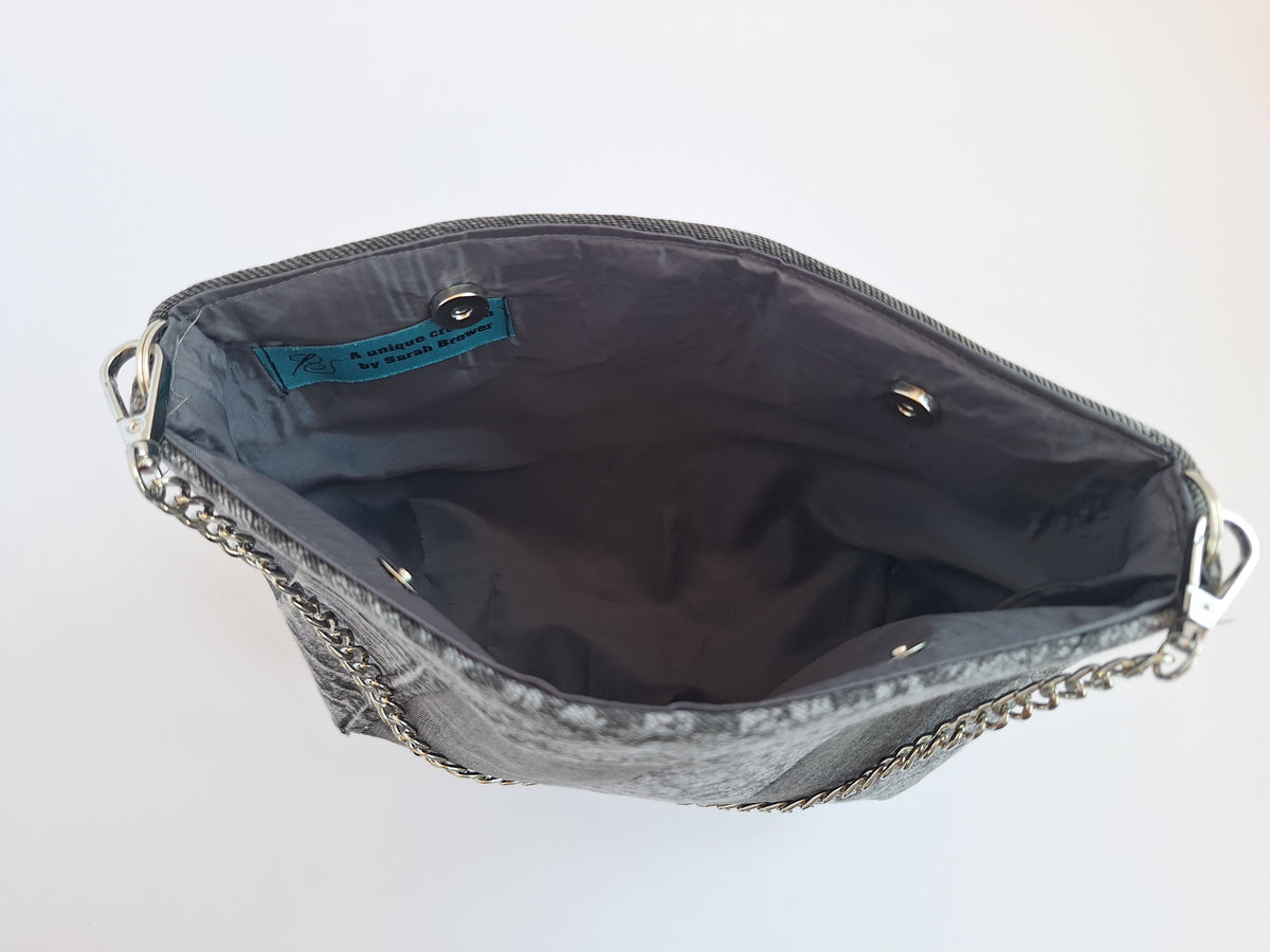Grey upcycled denim chain strap bag