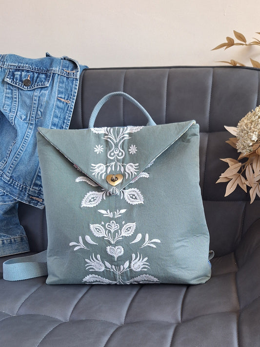 The Backpack: olive green with embroidered detail