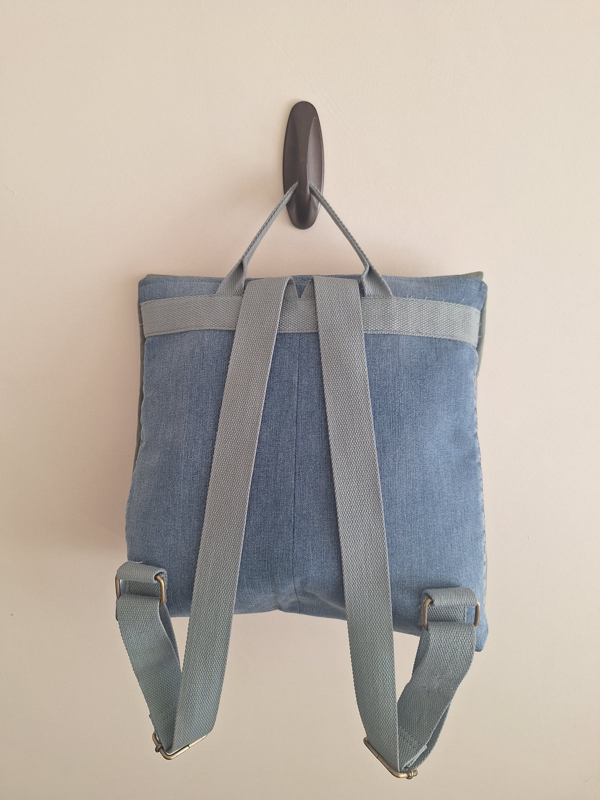 The Backpack: olive green with embroidered detail