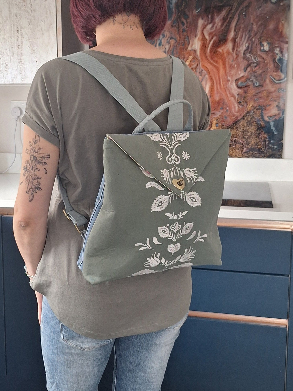 The Backpack: olive green with embroidered detail