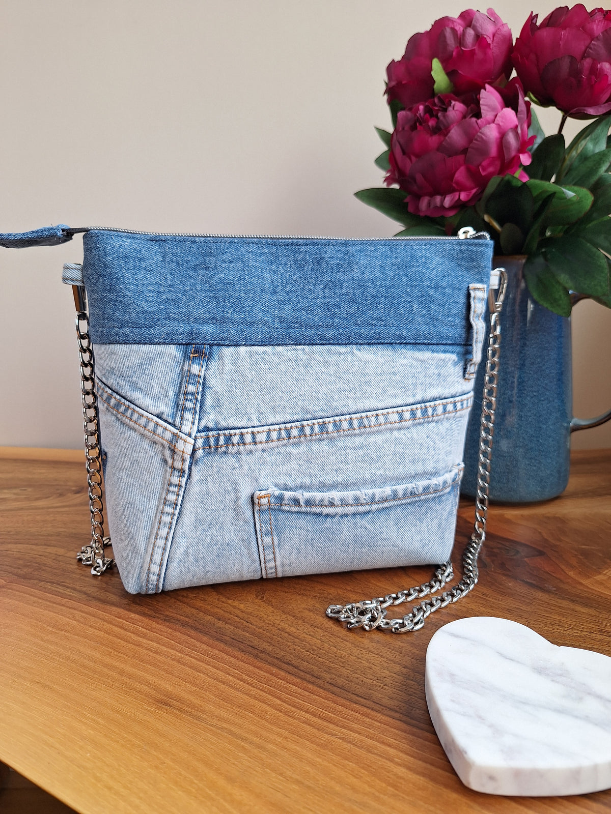 The Chain Strap: blue denim with yellow floral lining