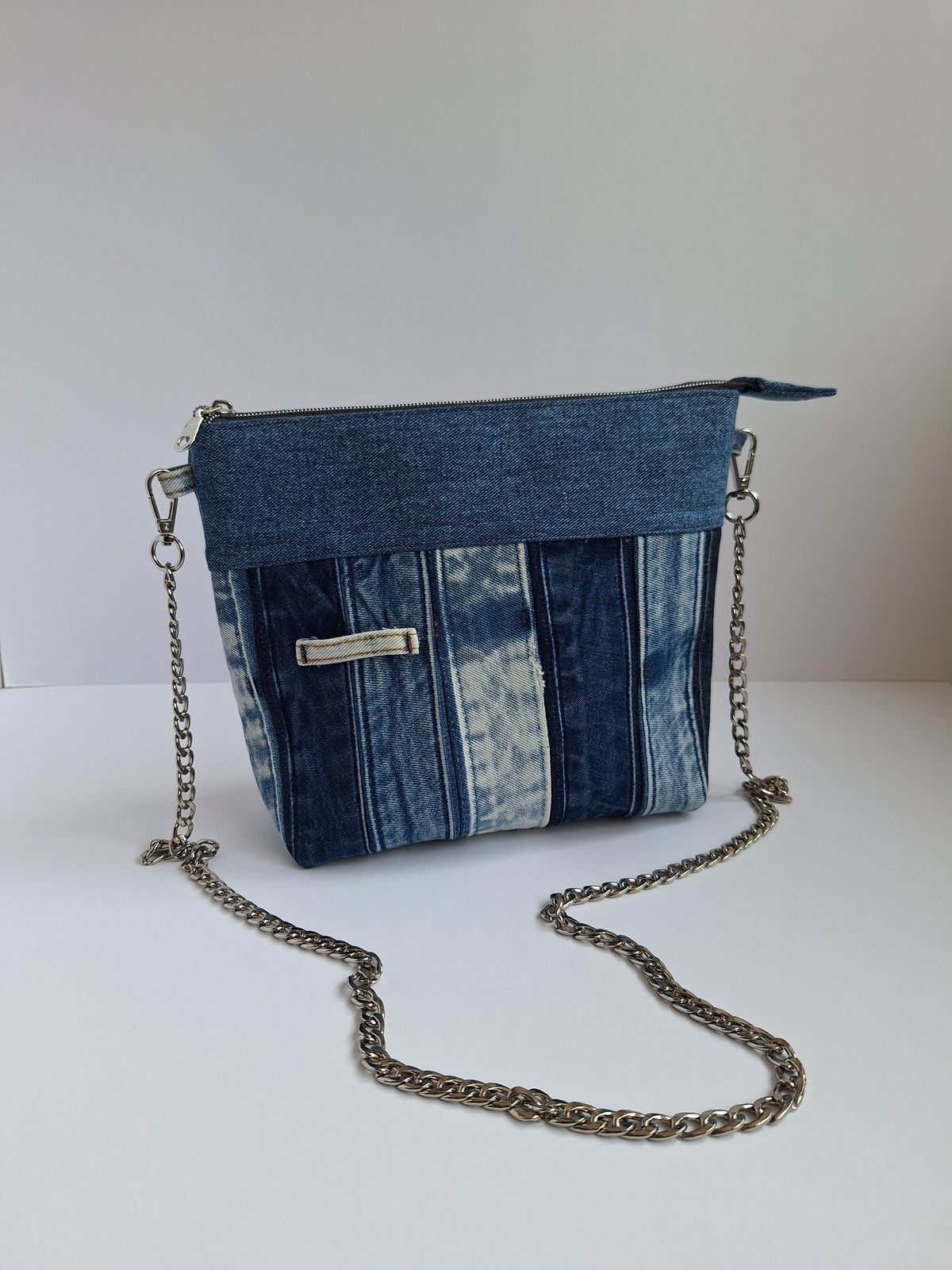 The Chain Strap: blue denim with yellow floral lining