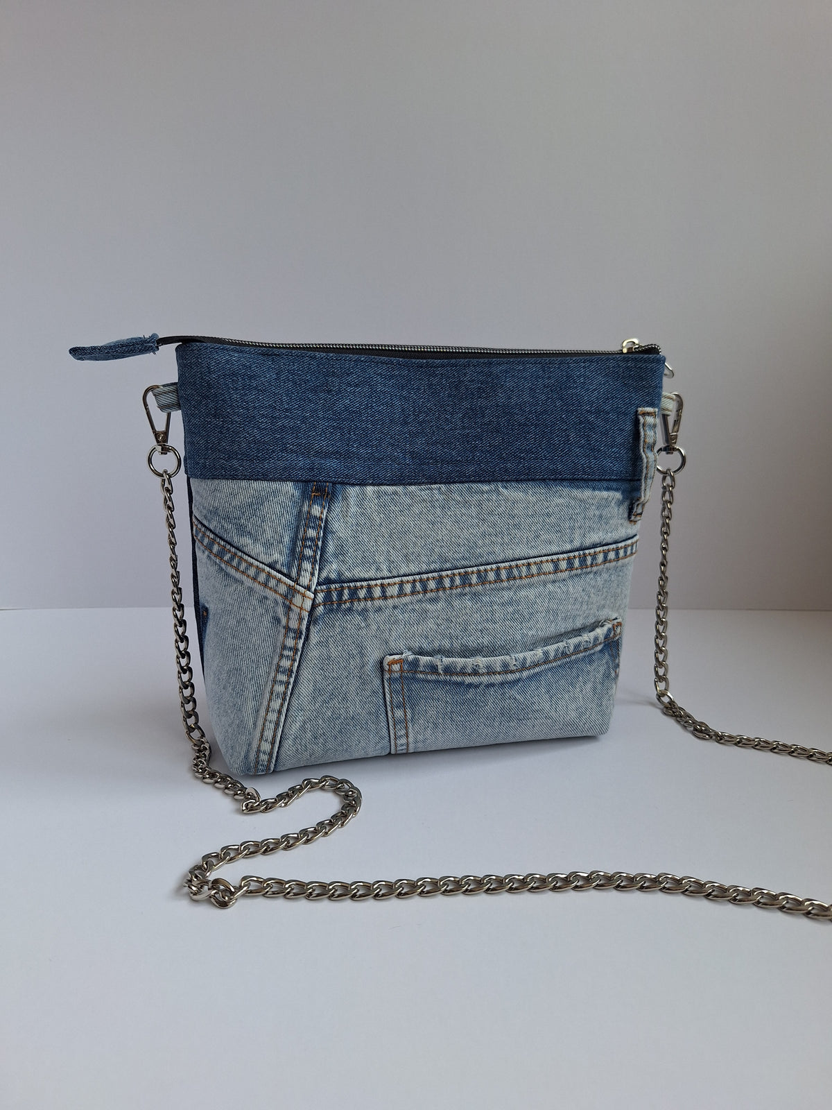 The Chain Strap: blue denim with yellow floral lining
