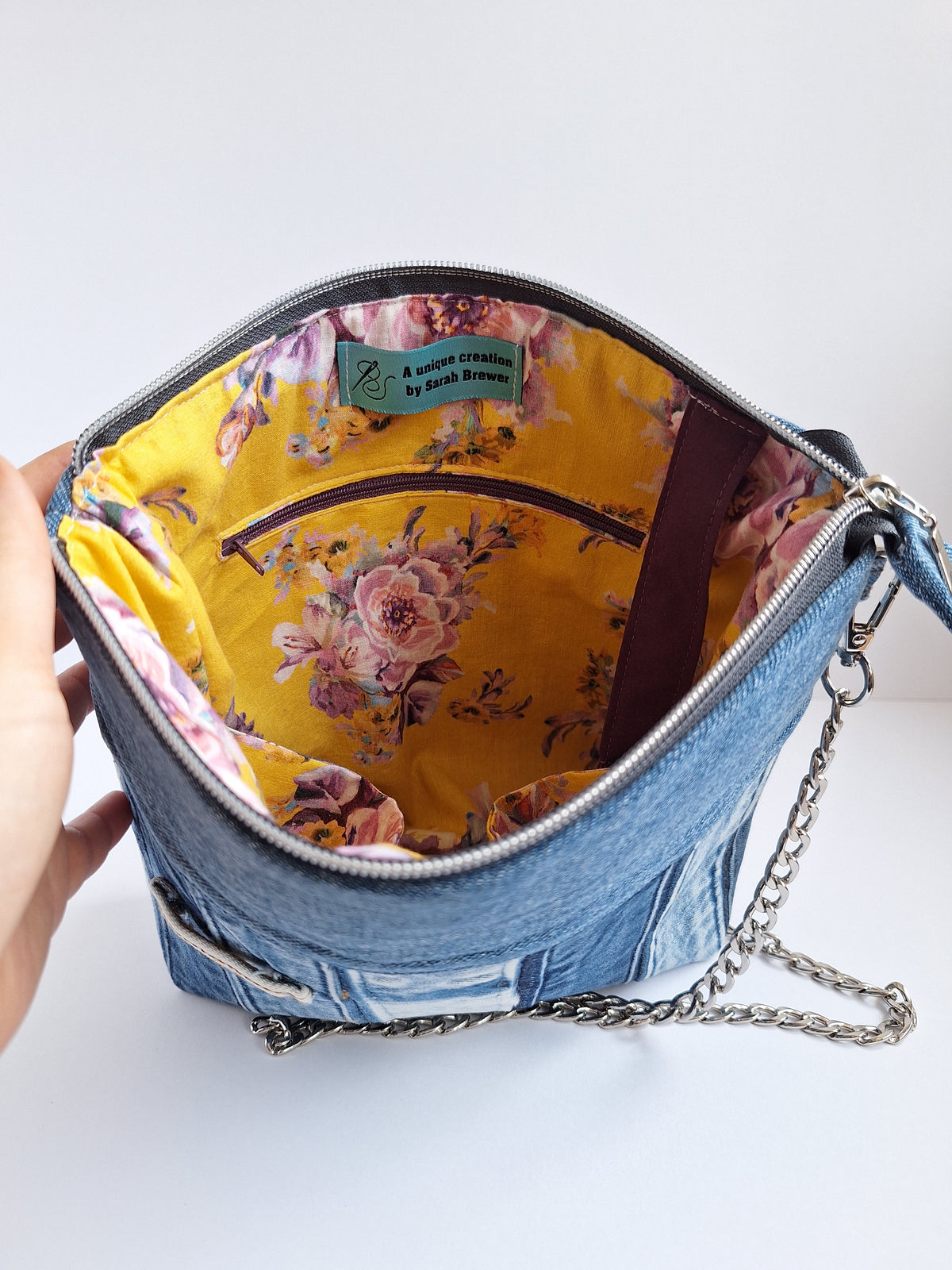 The Chain Strap: blue denim with yellow floral lining